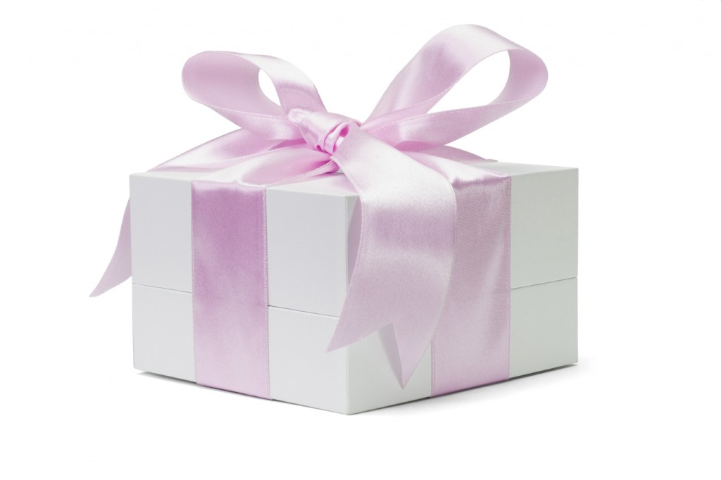 White gift box with pink bow ribbon